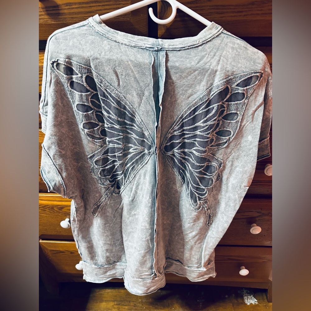 Stone blue mineral wash sheer butterfly top.